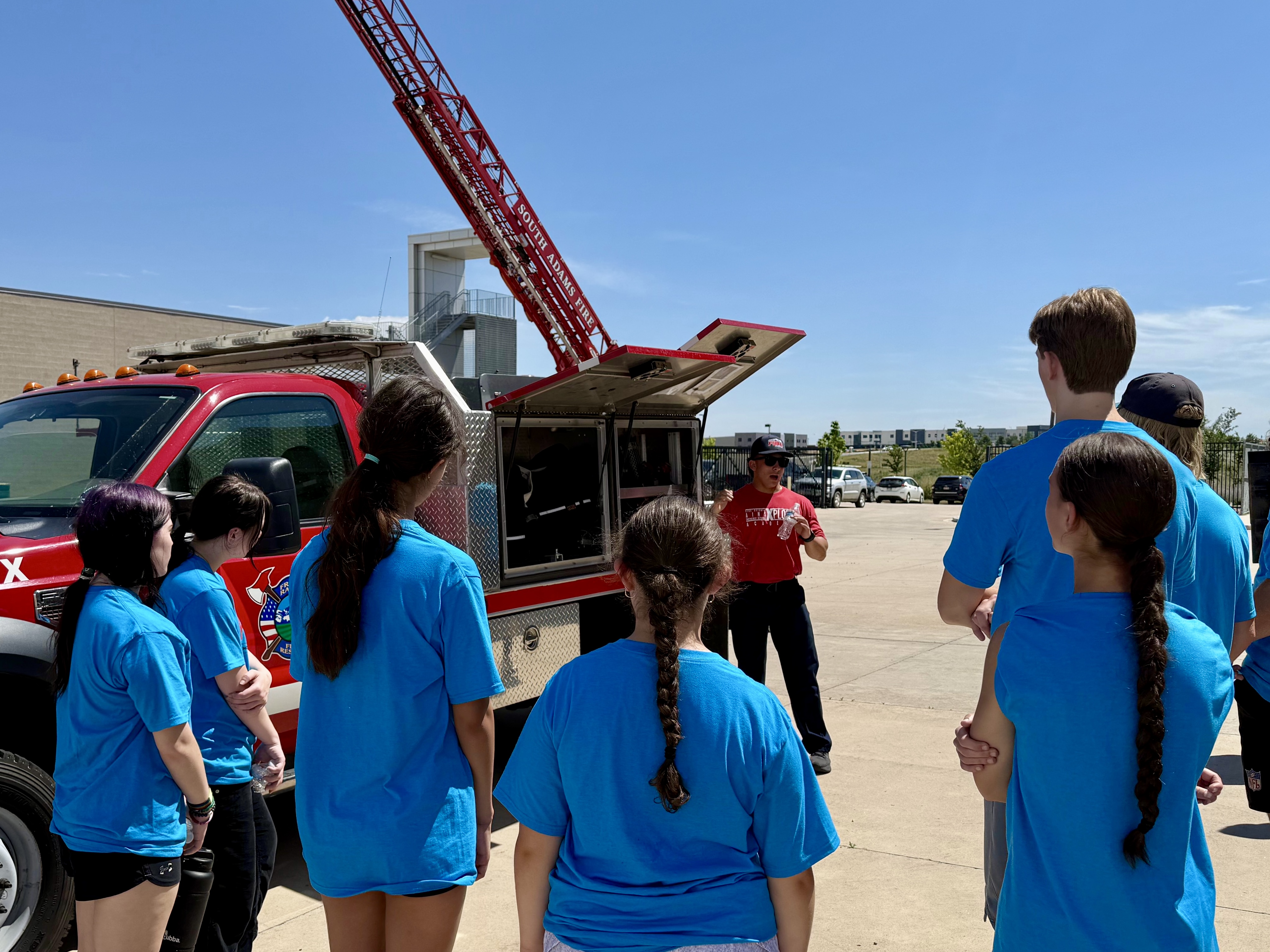 Image of FF in front of a truck