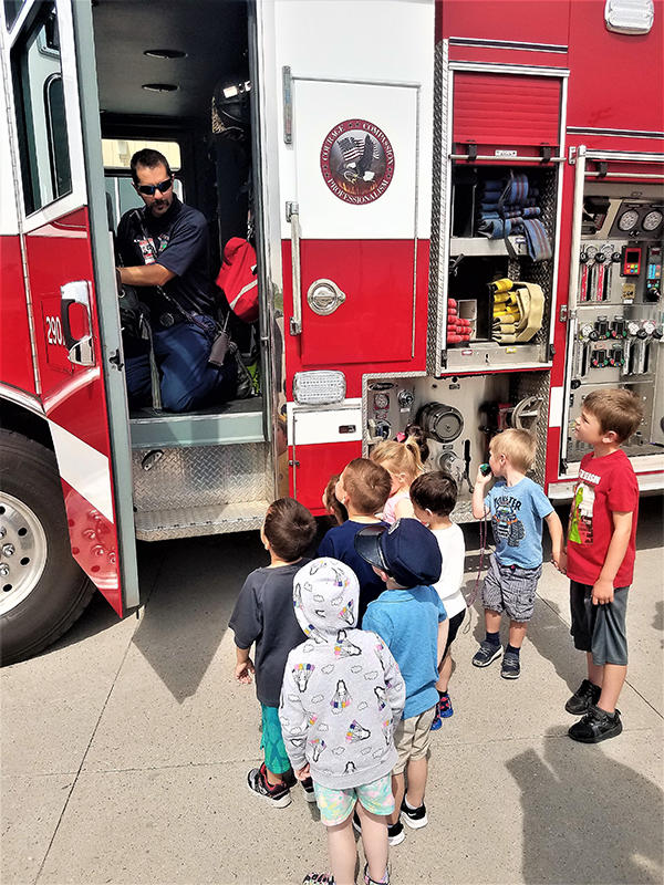 Picture of Young Kids Touring a Fire Truck
